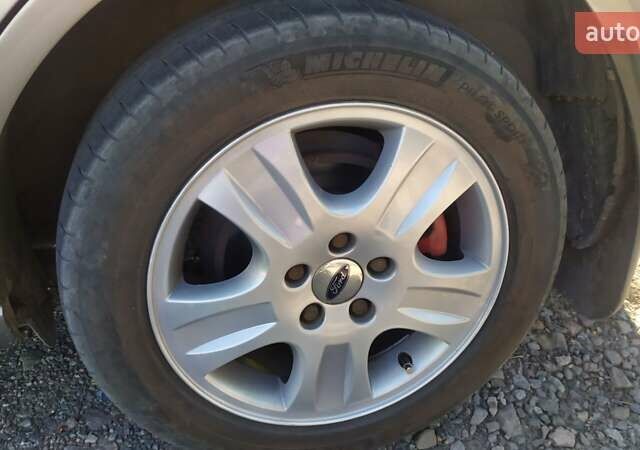 Бежевый Форд Мондео, объемом двигателя 2 л и пробегом 231 тыс. км за 5000 $, фото 26 на Automoto.ua