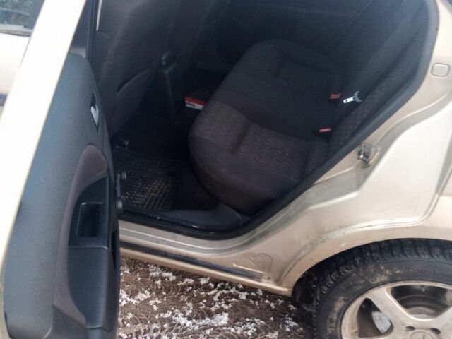 Бежевый Форд Мондео, объемом двигателя 2 л и пробегом 392 тыс. км за 1750 $, фото 1 на Automoto.ua