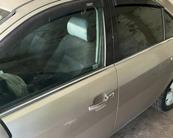 Бежевый Форд Мондео, объемом двигателя 2 л и пробегом 321 тыс. км за 1500 $, фото 6 на Automoto.ua