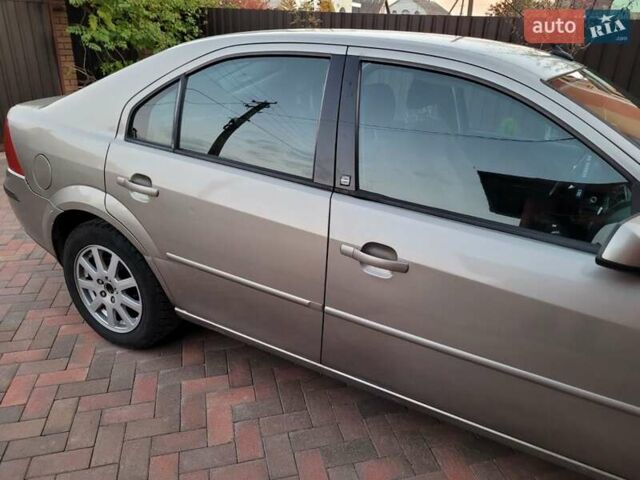 Бежевий Форд Мондео, об'ємом двигуна 2 л та пробігом 301 тис. км за 3250 $, фото 2 на Automoto.ua