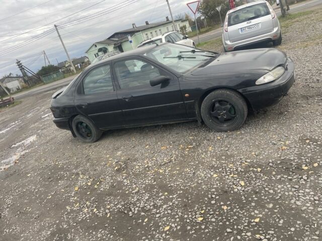 Черный Форд Мондео, объемом двигателя 2 л и пробегом 210 тыс. км за 1300 $, фото 1 на Automoto.ua