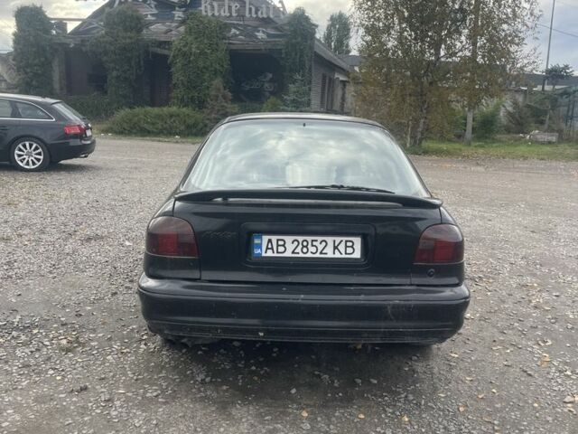 Черный Форд Мондео, объемом двигателя 2 л и пробегом 210 тыс. км за 1300 $, фото 2 на Automoto.ua