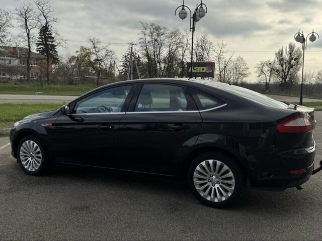 Чорний Форд Мондео, об'ємом двигуна 2 л та пробігом 204 тис. км за 6699 $, фото 5 на Automoto.ua