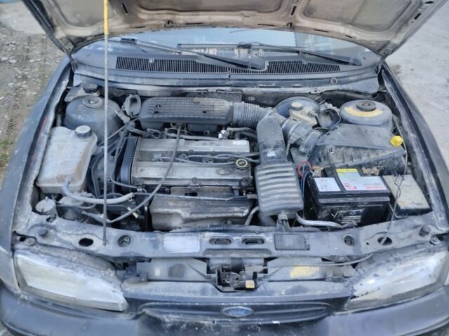 Черный Форд Мондео, объемом двигателя 2 л и пробегом 222 тыс. км за 500 $, фото 3 на Automoto.ua