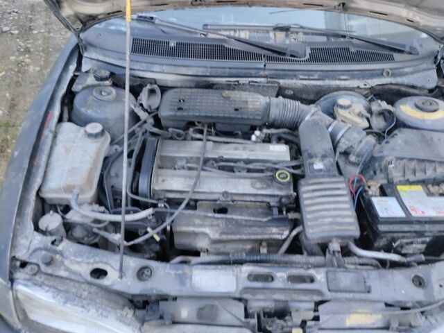 Черный Форд Мондео, объемом двигателя 2 л и пробегом 222 тыс. км за 500 $, фото 5 на Automoto.ua