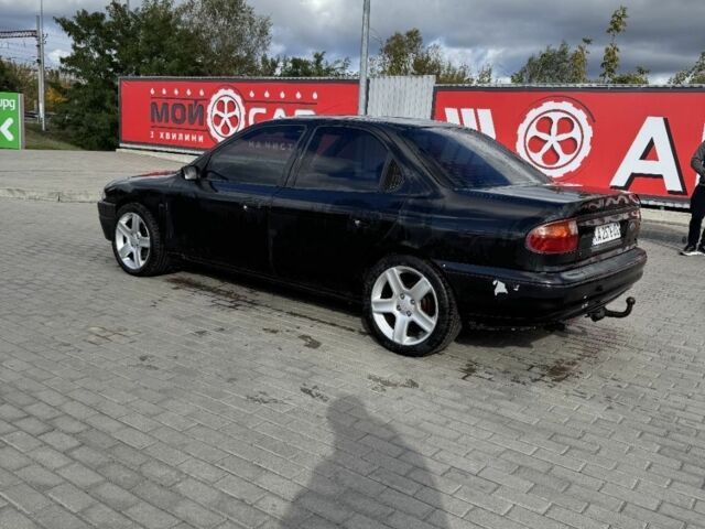 Черный Форд Мондео, объемом двигателя 1.8 л и пробегом 250 тыс. км за 1400 $, фото 1 на Automoto.ua