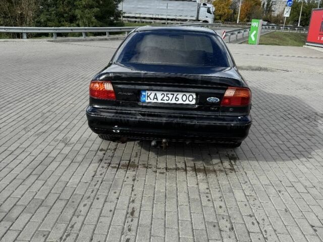 Черный Форд Мондео, объемом двигателя 1.8 л и пробегом 250 тыс. км за 1400 $, фото 5 на Automoto.ua