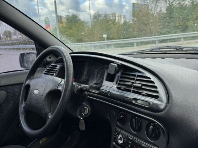 Черный Форд Мондео, объемом двигателя 1.8 л и пробегом 250 тыс. км за 1400 $, фото 11 на Automoto.ua