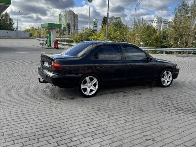 Черный Форд Мондео, объемом двигателя 1.8 л и пробегом 250 тыс. км за 1400 $, фото 4 на Automoto.ua