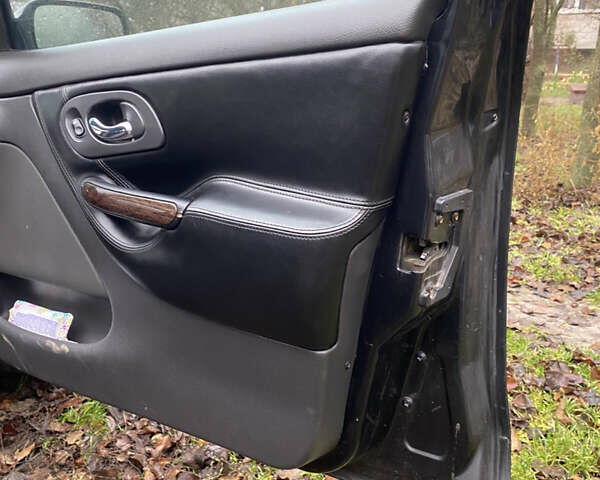 Черный Форд Мондео, объемом двигателя 2 л и пробегом 330 тыс. км за 2650 $, фото 5 на Automoto.ua