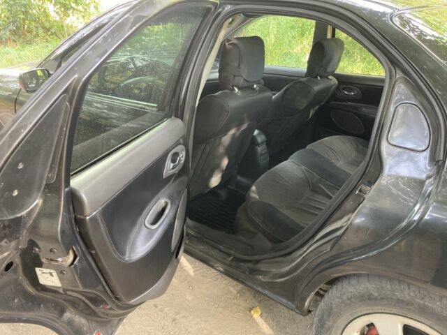 Черный Форд Мондео, объемом двигателя 2 л и пробегом 235 тыс. км за 2300 $, фото 5 на Automoto.ua