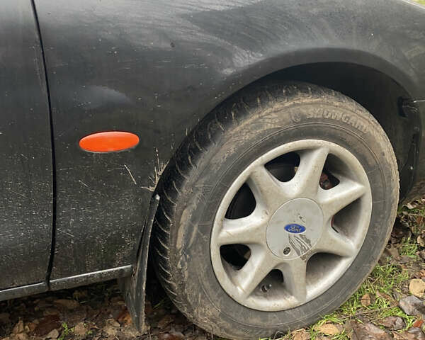 Черный Форд Мондео, объемом двигателя 2 л и пробегом 330 тыс. км за 2650 $, фото 1 на Automoto.ua