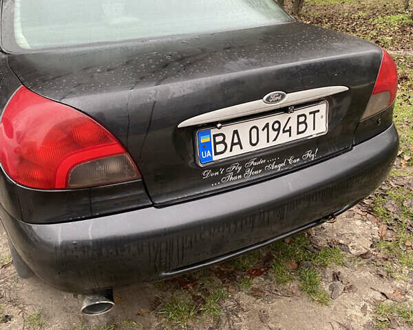 Черный Форд Мондео, объемом двигателя 2 л и пробегом 330 тыс. км за 2650 $, фото 8 на Automoto.ua