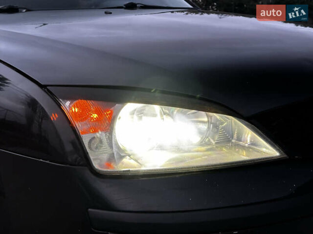 Черный Форд Мондео, объемом двигателя 2 л и пробегом 220 тыс. км за 2800 $, фото 7 на Automoto.ua