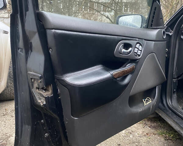 Черный Форд Мондео, объемом двигателя 2 л и пробегом 330 тыс. км за 2650 $, фото 13 на Automoto.ua