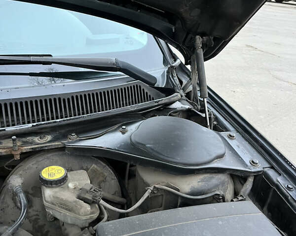 Чорний Форд Мондео, об'ємом двигуна 1.8 л та пробігом 319 тис. км за 2500 $, фото 23 на Automoto.ua