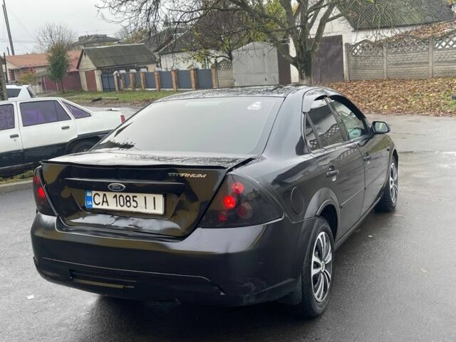 Черный Форд Мондео, объемом двигателя 2 л и пробегом 185 тыс. км за 2150 $, фото 3 на Automoto.ua