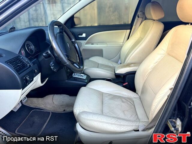 Черный Форд Мондео, объемом двигателя 2.5 л и пробегом 265 тыс. км за 3800 $, фото 7 на Automoto.ua