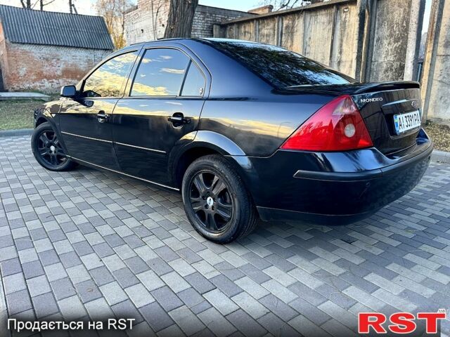 Черный Форд Мондео, объемом двигателя 2.5 л и пробегом 265 тыс. км за 3800 $, фото 5 на Automoto.ua