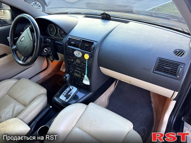 Черный Форд Мондео, объемом двигателя 2.5 л и пробегом 265 тыс. км за 3800 $, фото 10 на Automoto.ua