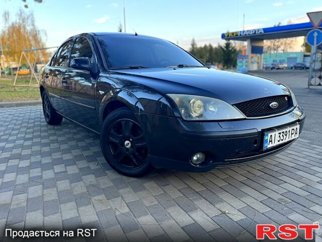 Черный Форд Мондео, объемом двигателя 2.5 л и пробегом 265 тыс. км за 3800 $, фото 1 на Automoto.ua