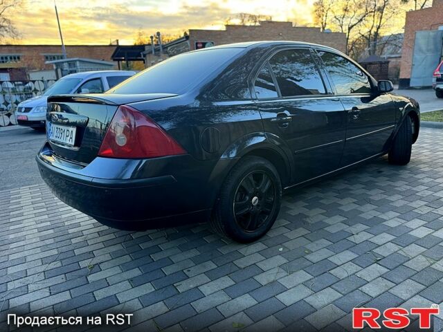 Черный Форд Мондео, объемом двигателя 2.5 л и пробегом 265 тыс. км за 3800 $, фото 4 на Automoto.ua