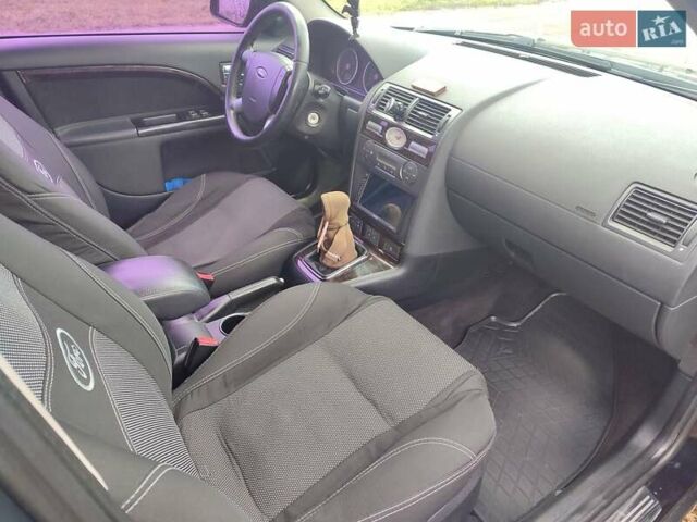 Черный Форд Мондео, объемом двигателя 2 л и пробегом 225 тыс. км за 5900 $, фото 9 на Automoto.ua