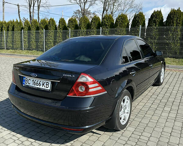 Форд Мондео 2004 в Львове на Automoto.ua Черный Форд Мондео, объемом двигателя 2 л и пробегом 269 тыс. км за 3999 $, фото 21 на Automoto.ua
