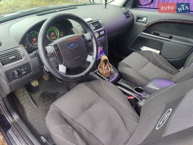 Черный Форд Мондео, объемом двигателя 2 л и пробегом 225 тыс. км за 5900 $, фото 7 на Automoto.ua