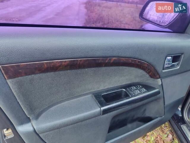 Черный Форд Мондео, объемом двигателя 2 л и пробегом 225 тыс. км за 5900 $, фото 14 на Automoto.ua