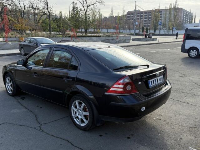 Черный Форд Мондео, объемом двигателя 2 л и пробегом 250 тыс. км за 2000 $, фото 3 на Automoto.ua