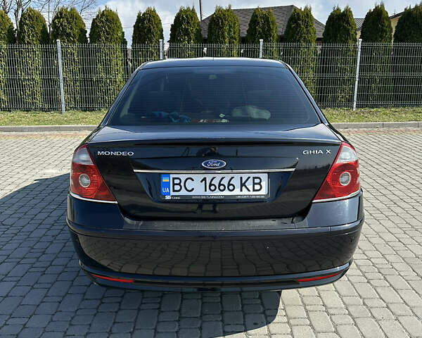 Форд Мондео 2004 в Львове на Automoto.ua Черный Форд Мондео, объемом двигателя 2 л и пробегом 269 тыс. км за 3999 $, фото 20 на Automoto.ua
