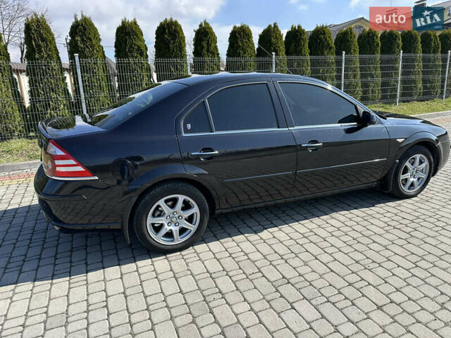 Форд Мондео 2004 в Львове на Automoto.ua Черный Форд Мондео, объемом двигателя 2 л и пробегом 269 тыс. км за 3999 $, фото 31 на Automoto.ua