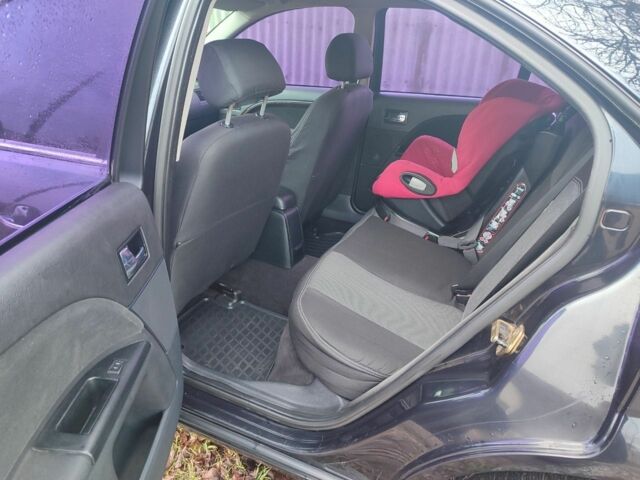 Чорний Форд Мондео, об'ємом двигуна 2 л та пробігом 225 тис. км за 5900 $, фото 9 на Automoto.ua