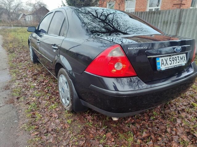 Чорний Форд Мондео, об'ємом двигуна 2 л та пробігом 225 тис. км за 5900 $, фото 1 на Automoto.ua