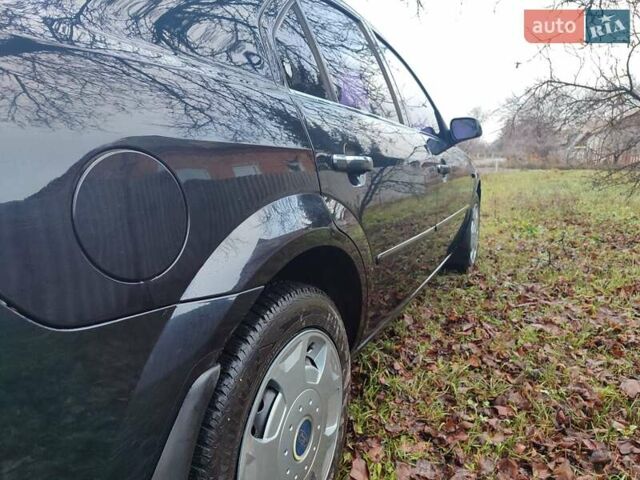 Черный Форд Мондео, объемом двигателя 2 л и пробегом 225 тыс. км за 5900 $, фото 5 на Automoto.ua