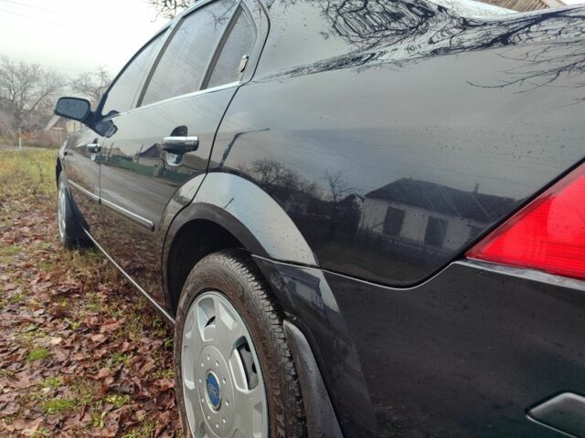 Чорний Форд Мондео, об'ємом двигуна 2 л та пробігом 225 тис. км за 5900 $, фото 7 на Automoto.ua