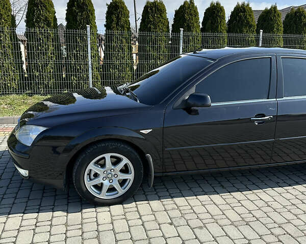 Форд Мондео 2004 в Львове на Automoto.ua Черный Форд Мондео, объемом двигателя 2 л и пробегом 269 тыс. км за 3999 $, фото 28 на Automoto.ua