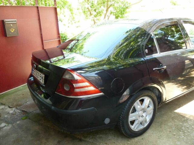 Черный Форд Мондео, объемом двигателя 2 л и пробегом 180 тыс. км за 5900 $, фото 9 на Automoto.ua