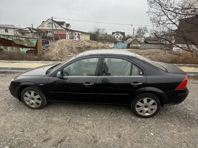 Черный Форд Мондео, объемом двигателя 2 л и пробегом 300 тыс. км за 2500 $, фото 13 на Automoto.ua