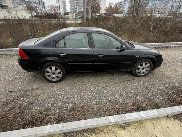 Черный Форд Мондео, объемом двигателя 2 л и пробегом 300 тыс. км за 2500 $, фото 12 на Automoto.ua