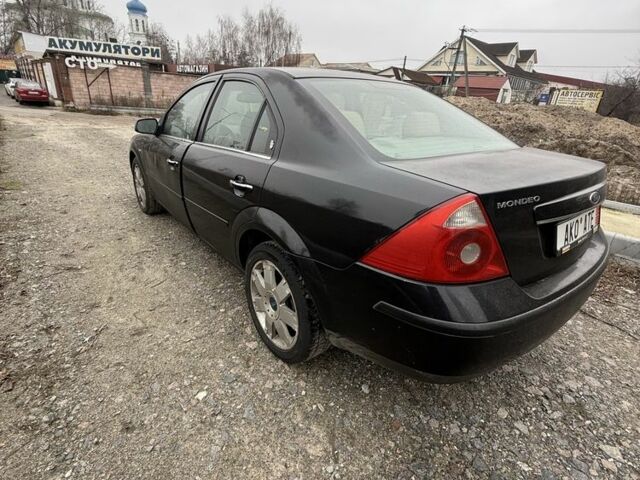 Черный Форд Мондео, объемом двигателя 2 л и пробегом 300 тыс. км за 2500 $, фото 9 на Automoto.ua