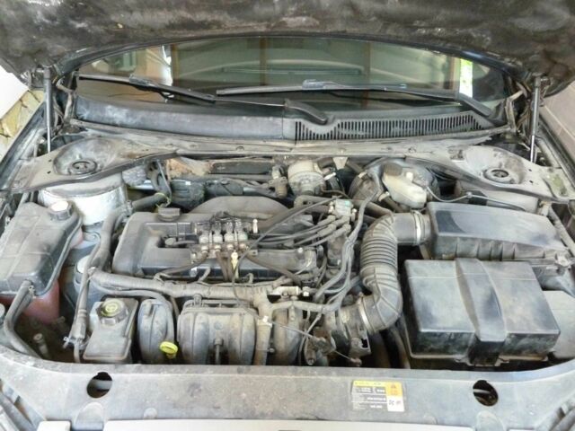 Черный Форд Мондео, объемом двигателя 2 л и пробегом 180 тыс. км за 5900 $, фото 12 на Automoto.ua