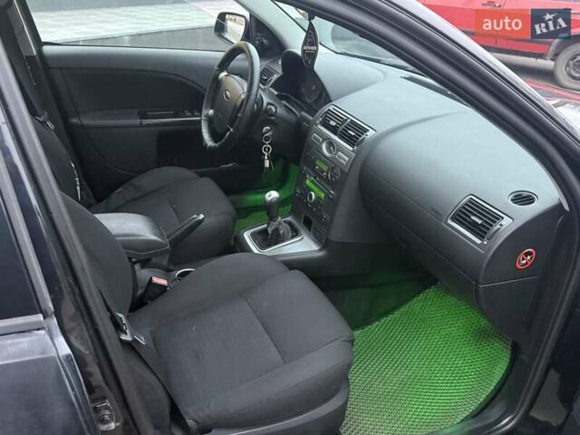 Черный Форд Мондео, объемом двигателя 1.8 л и пробегом 200 тыс. км за 2950 $, фото 12 на Automoto.ua