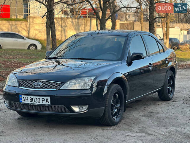 Черный Форд Мондео, объемом двигателя 2 л и пробегом 260 тыс. км за 4799 $, фото 4 на Automoto.ua