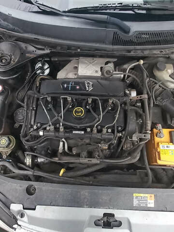 Черный Форд Мондео, объемом двигателя 2 л и пробегом 236 тыс. км за 5400 $, фото 1 на Automoto.ua