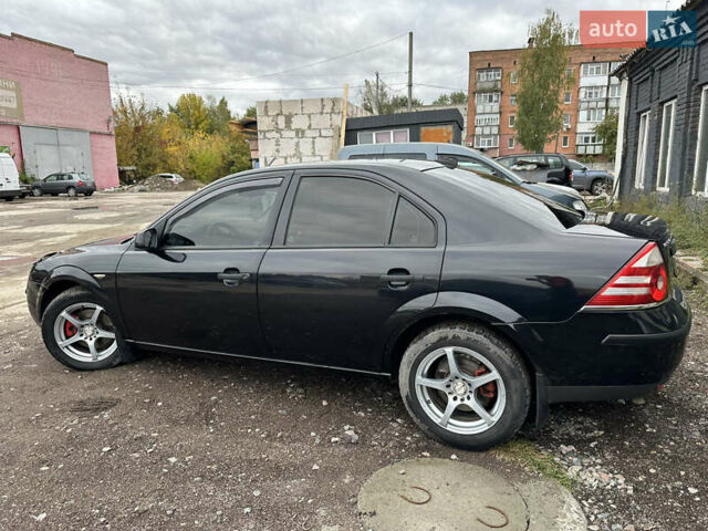 Черный Форд Мондео, объемом двигателя 1.8 л и пробегом 313 тыс. км за 5200 $, фото 14 на Automoto.ua