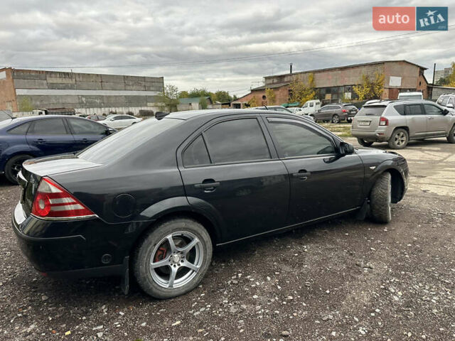 Черный Форд Мондео, объемом двигателя 1.8 л и пробегом 313 тыс. км за 5200 $, фото 7 на Automoto.ua