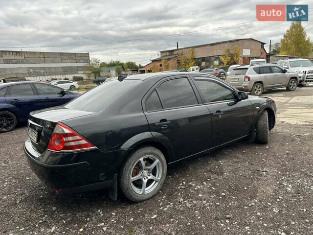 Черный Форд Мондео, объемом двигателя 1.8 л и пробегом 313 тыс. км за 5200 $, фото 8 на Automoto.ua