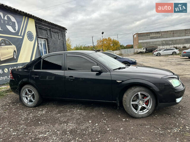 Черный Форд Мондео, объемом двигателя 1.8 л и пробегом 313 тыс. км за 5200 $, фото 6 на Automoto.ua